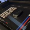 Quadro Exclusivo Decorativo com Temática BMW X5, com Chave 3D e Notas de Dólares